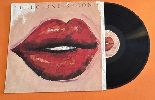 Yello one second - -,